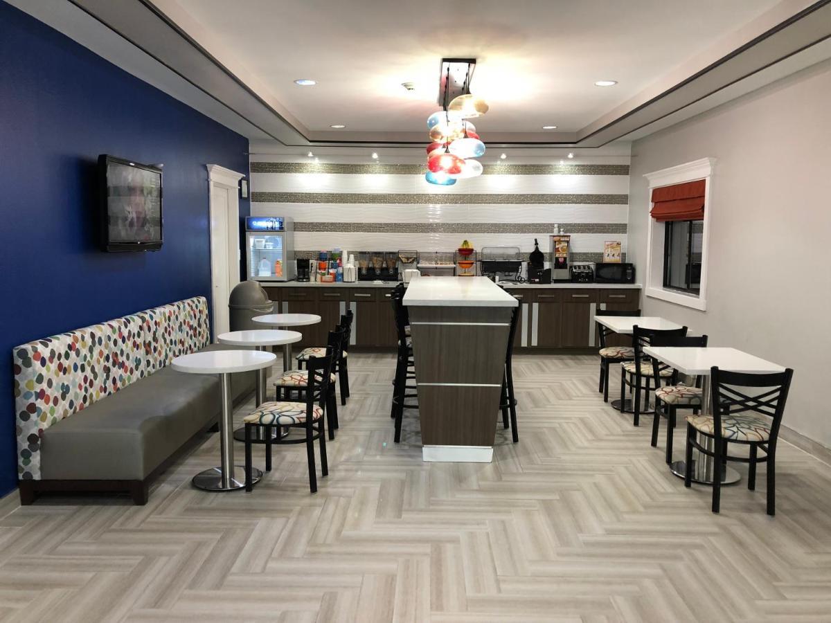 Executive Inn And Suites Joaquin Buitenkant foto