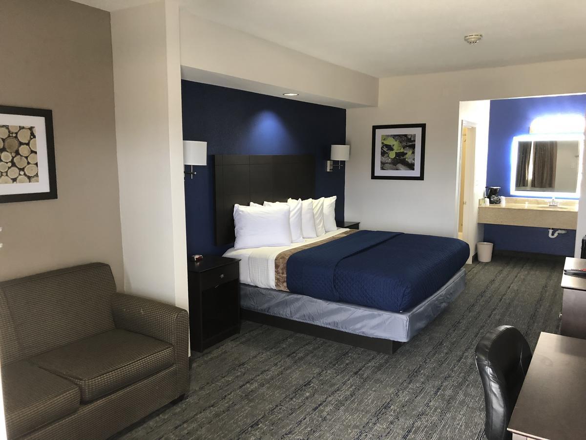 Executive Inn And Suites Joaquin Buitenkant foto