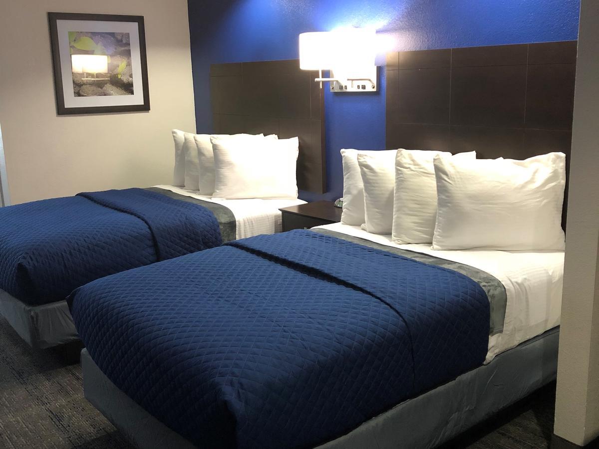 Executive Inn And Suites Joaquin Buitenkant foto