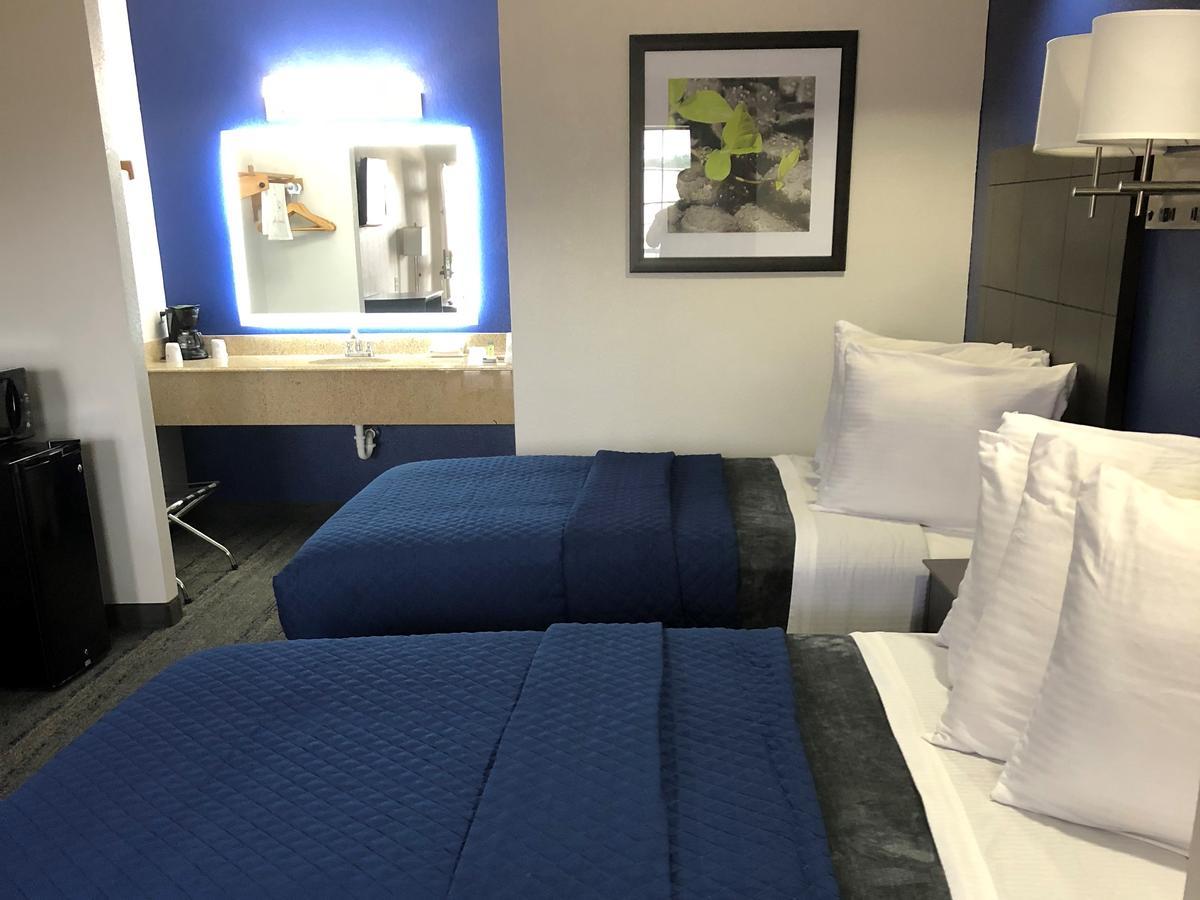 Executive Inn And Suites Joaquin Buitenkant foto