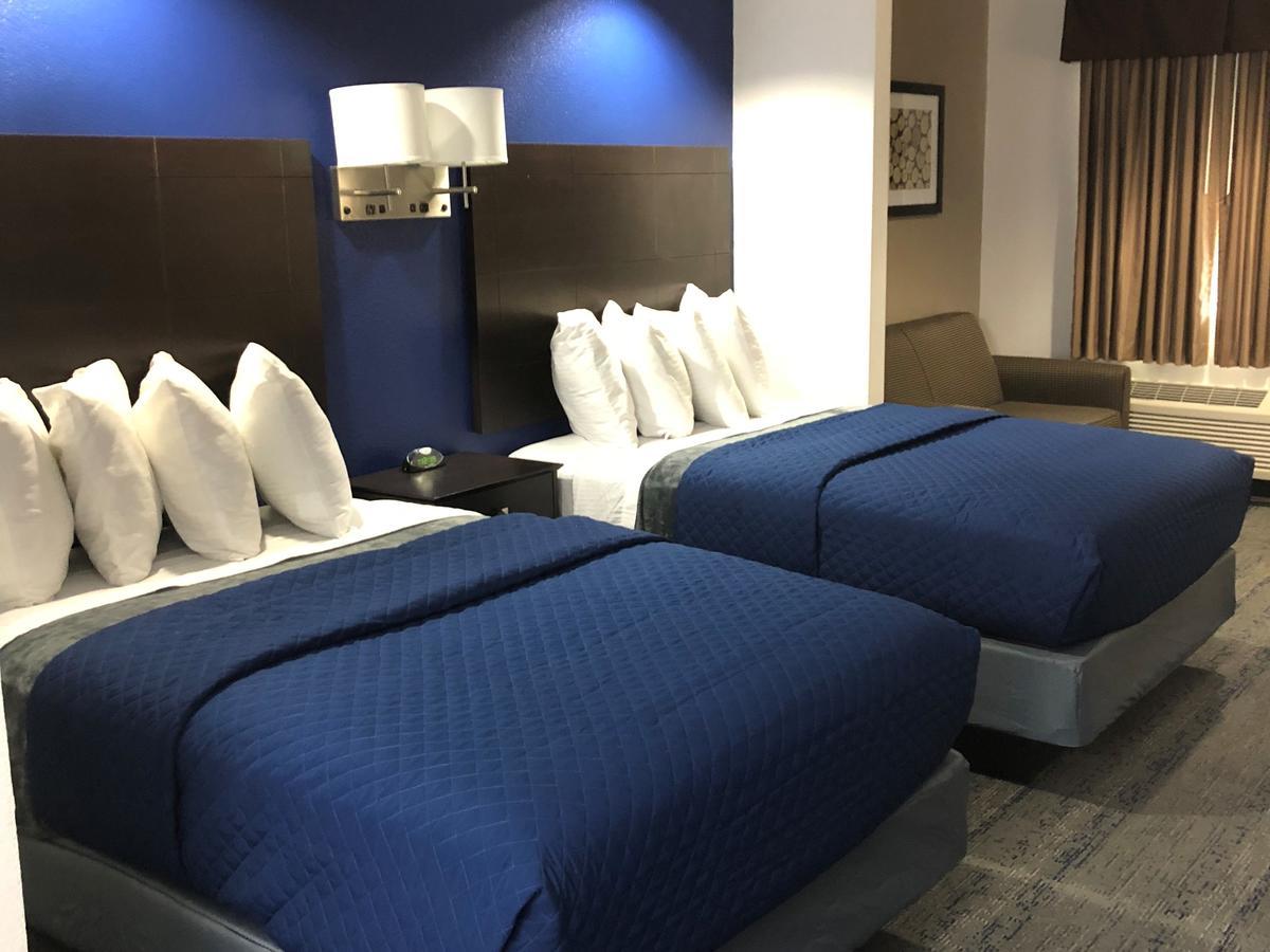 Executive Inn And Suites Joaquin Buitenkant foto