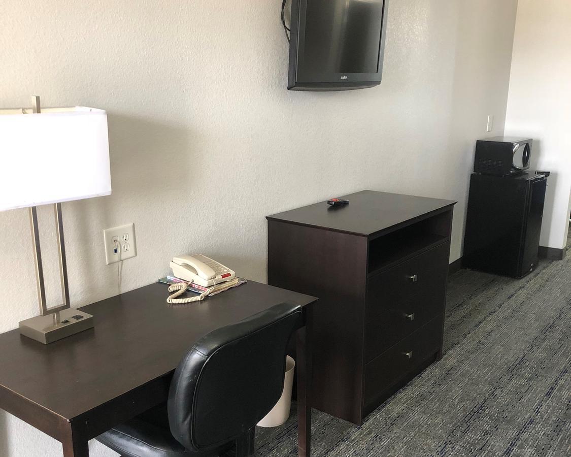 Executive Inn And Suites Joaquin Buitenkant foto