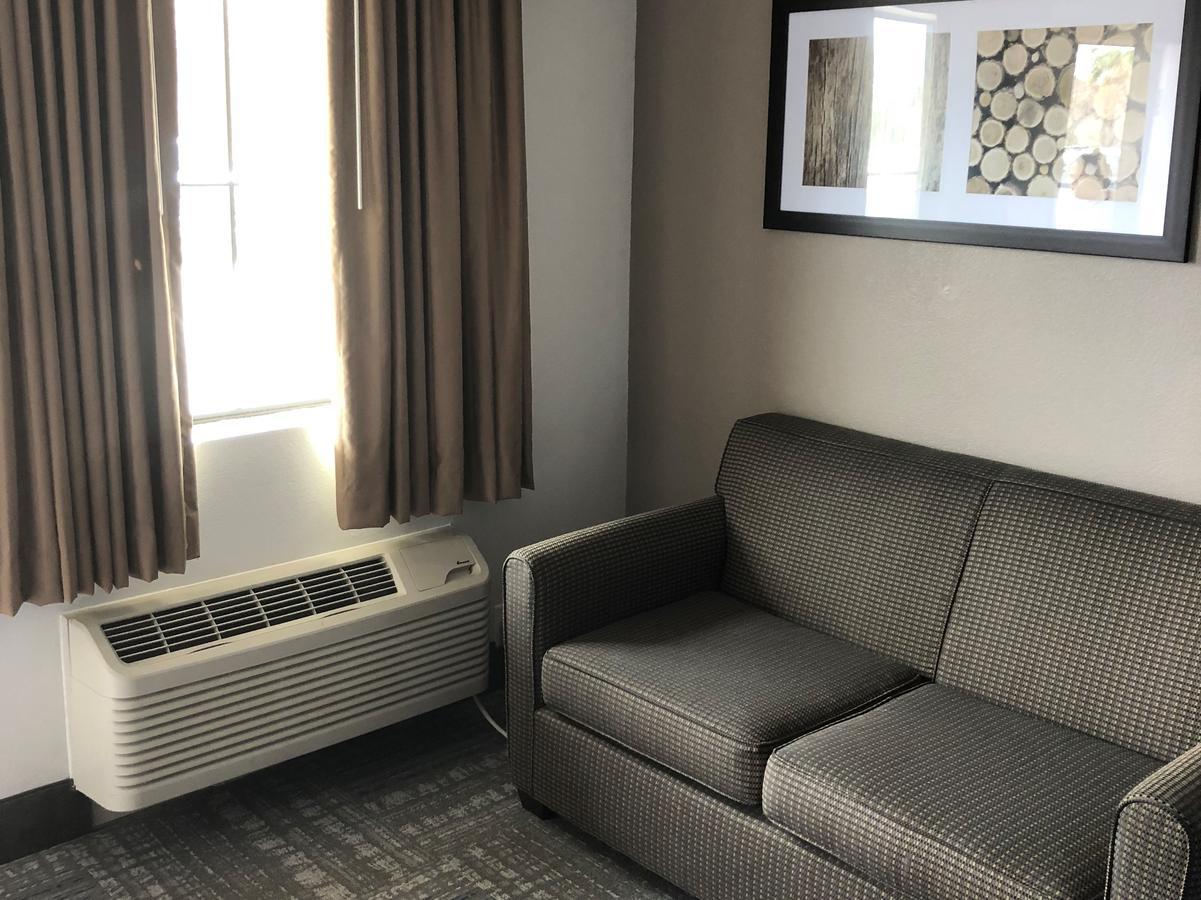 Executive Inn And Suites Joaquin Buitenkant foto